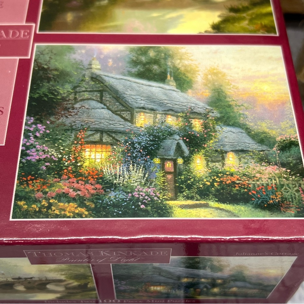 The Thomas Kinkade 2 in 1 - 100 piece ea. mini puzzle-NEW in box-Unopened